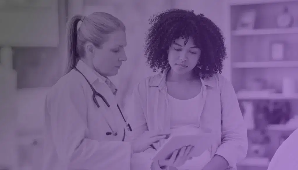 Doctor dsicussing document intelligent delivery system with patient