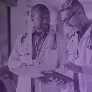 Doctors discussing how to resolve healthcare’s biggest financial challenges